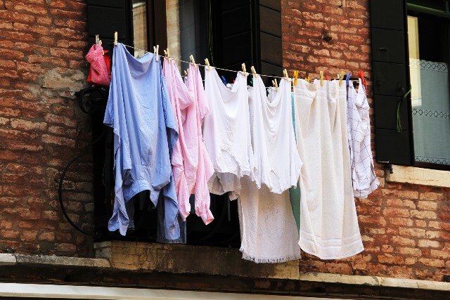 Laundry hanging up as an example of sustainability.