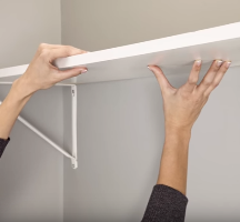 Removing an old closet system.