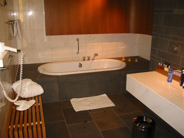 Seal the tub after installing tile.