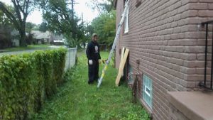 AMUS volunteer securing a property.