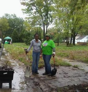 AMUS volunteers posing during street cleanup.
