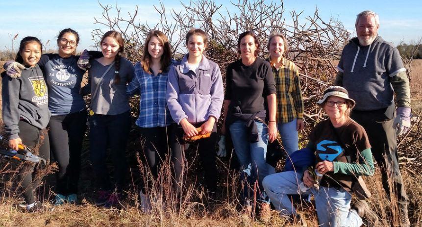 Group of river cleanup volunteers.