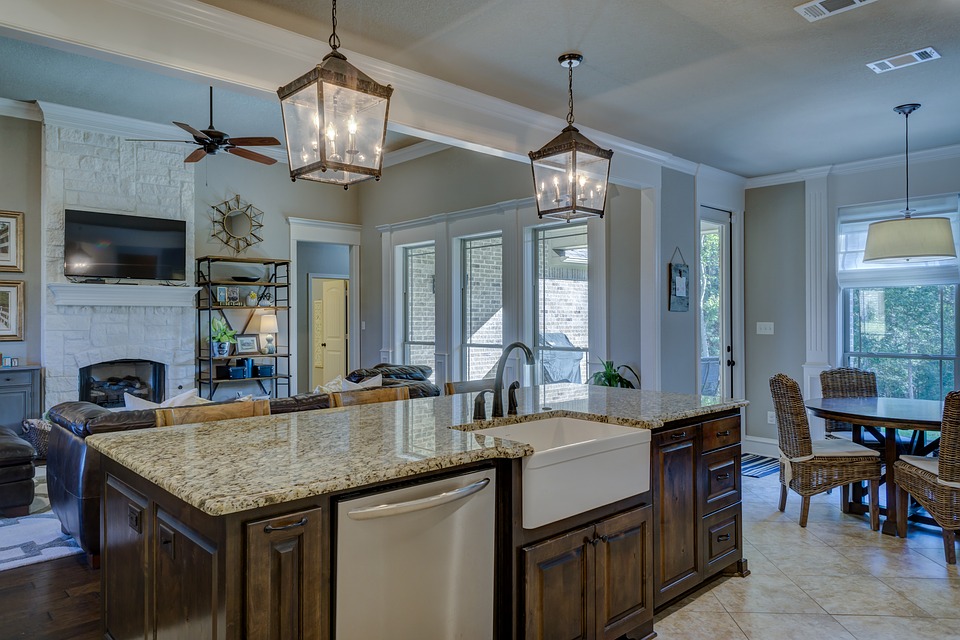 Turning a galley kitchen into an open kitchen.