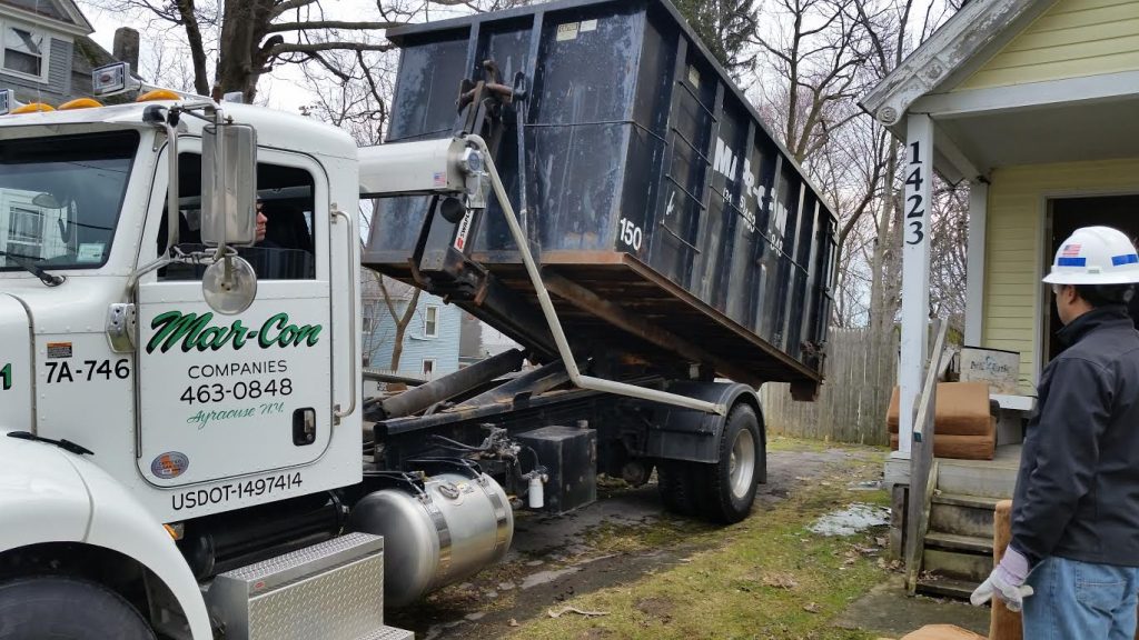 Budget Dumpster delivering a dumpster for the cleanup.
