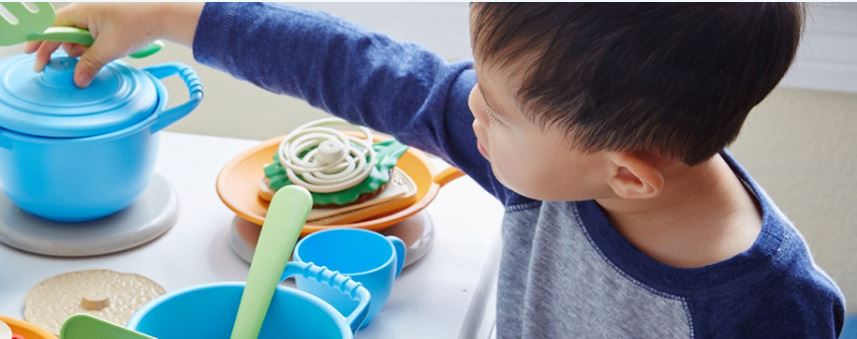 A child playing with eco-friendly toys.