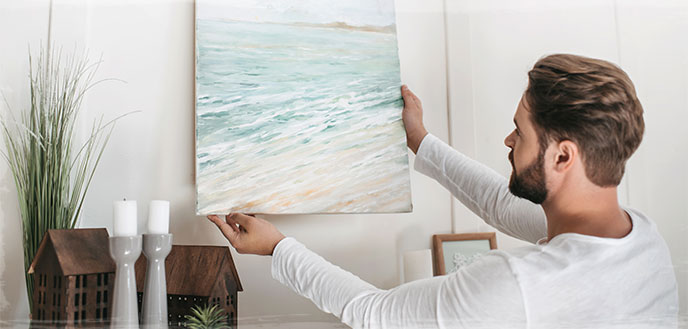 Hanging a Painting