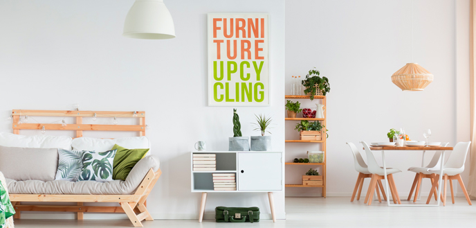 Image of a room quirky cabinet with a poster above it saying Furniture Upcycling