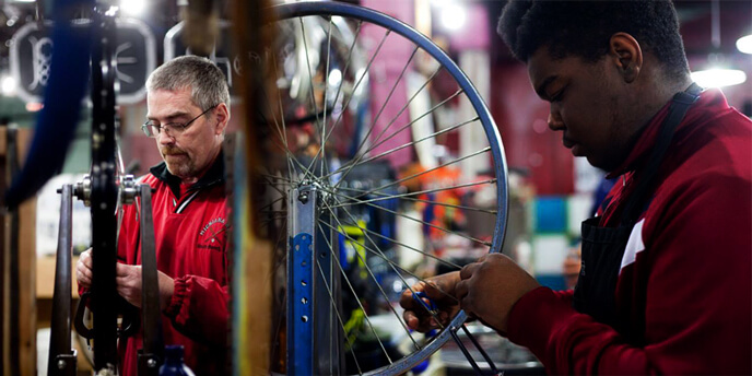 Mechanics Working on Bikes