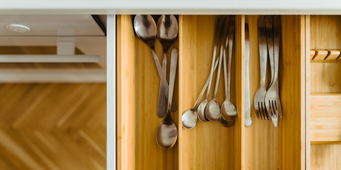 Image of Kitchen Utensil Drawer Being Unpacked After Moving House
