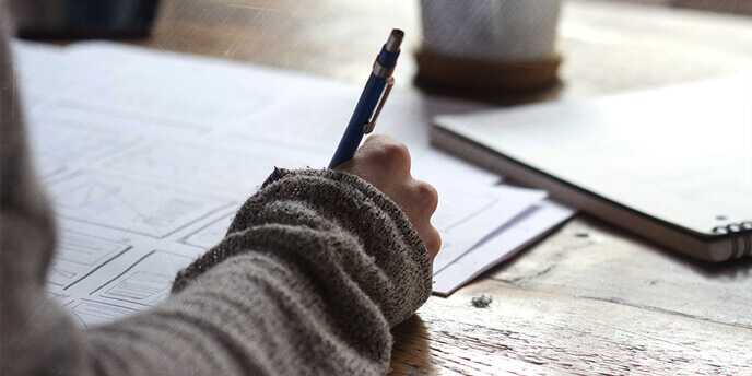 Person Drafting a Home Renovation Project Plan