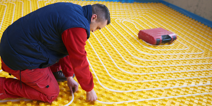 Contractor Installing a Radiant Heating Floor