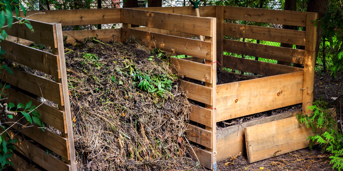 Two Homemade Wooden Compost Bins