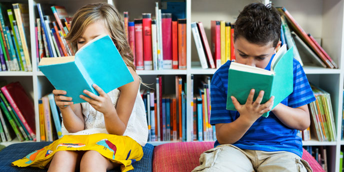 Children Reading in At-Home Playroom Library