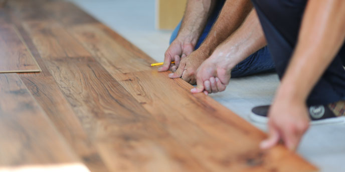 Men Installing Laminate Flooring