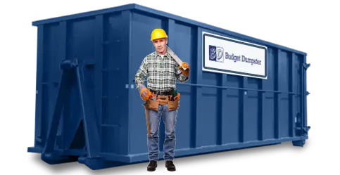 Construction worker in front of 40 yard dumpster