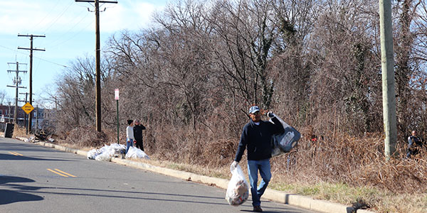 Anacostia Riverkeeper Volunteers Carrying Trash