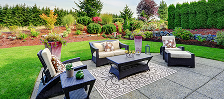 Green Backyard With Garden Chairs