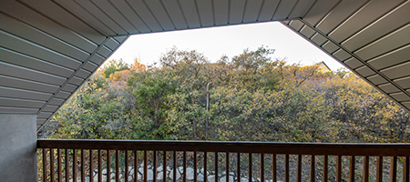 Terrace With Beadboard Ceiling and Railing