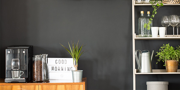 Black Accent Wall in Kitchen With Coffee Bar