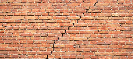 Stair-Step Crack in Red Brick Wall