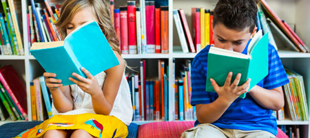 Children Reading in At-Home Playroom Library