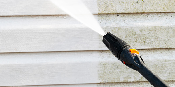 Cleaning Home with Power Washer