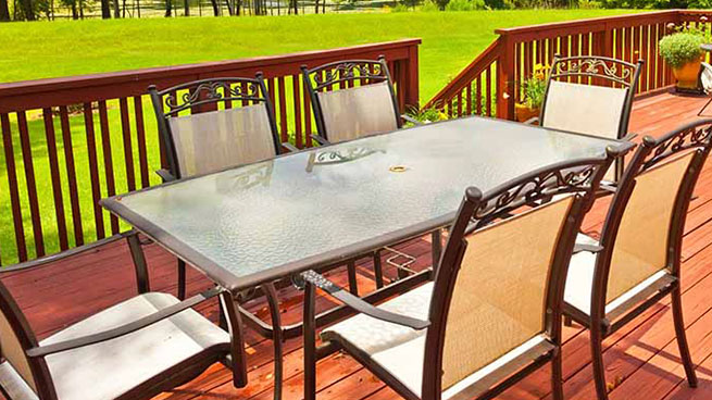 Table and Chairs Outside on a Deck