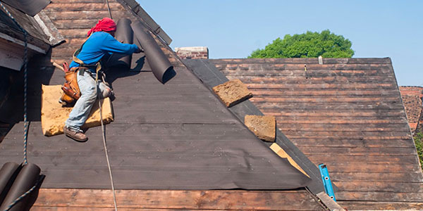 Man Completing a Roofing Project