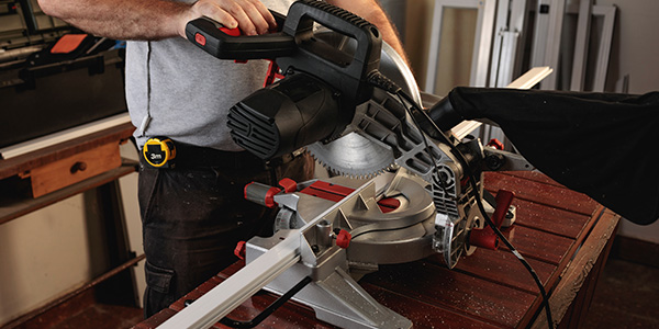 Home Improvement Contractor With Miter Saw