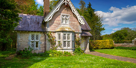 Stone Cottage With Bay Window: Cozy Charm.