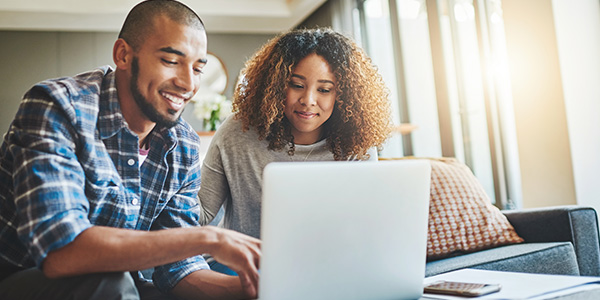 Couple Changing Home Address Online