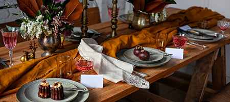 Table With Flowers and Table Settings