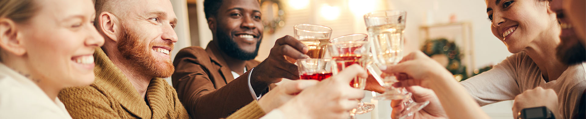 Happy Holiday Party In Decorated Dining Room