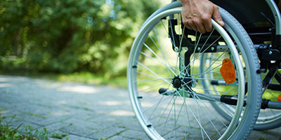 Wheelchair on Stone Walkway