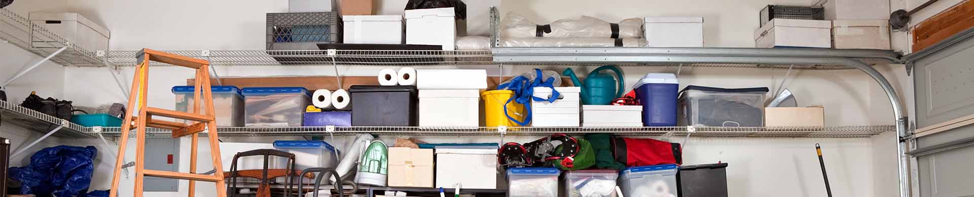 Messy Garage With Ladder and Shelves