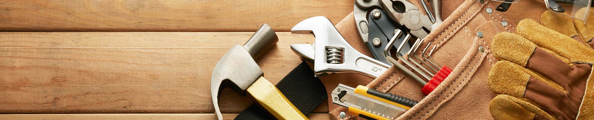 Construction Tools on Wood Surface