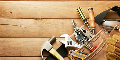 Construction Tools on Wood Surface