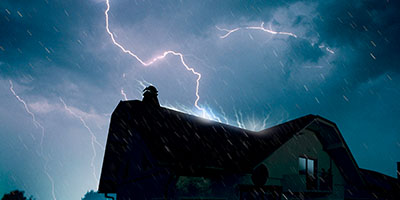 Lightning Striking Roof of House