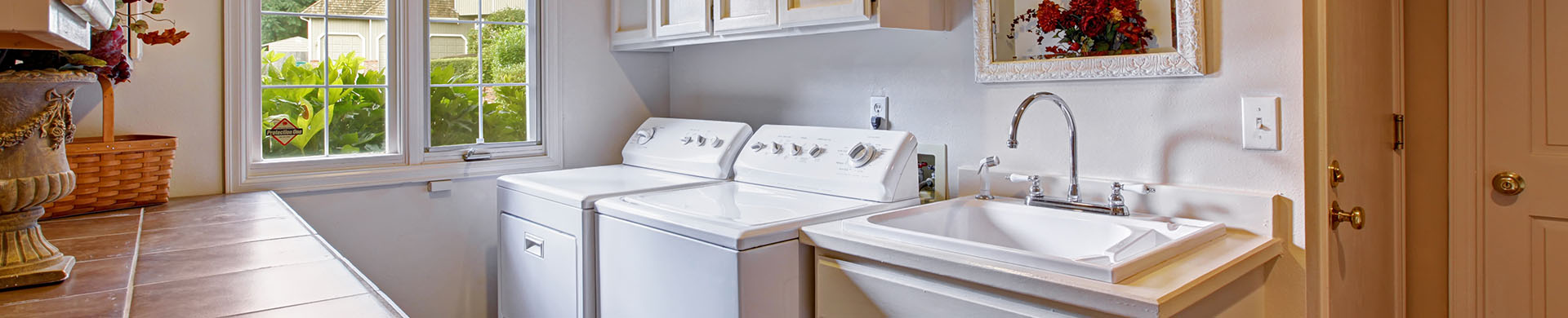 Washer and Dryer and Sink in a Small Laundry Room