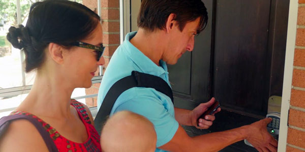 Family Checking Into Airbnb Via RemoteLock Front Door Lock