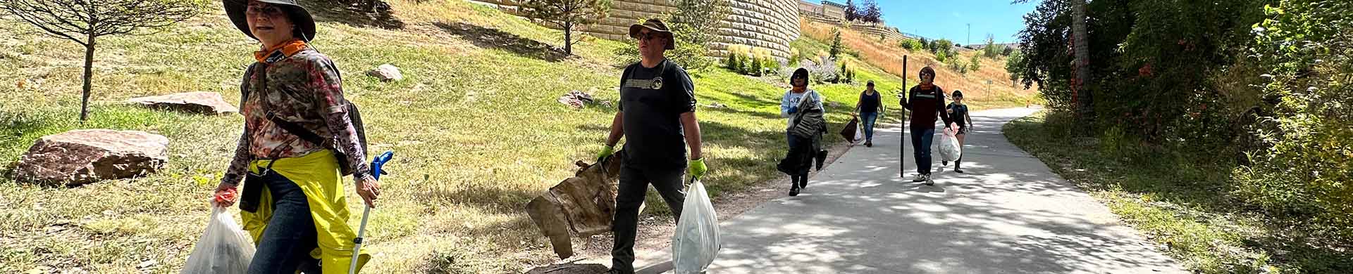 Volunteers Walking to Cleanup Sites at Fountain Creek