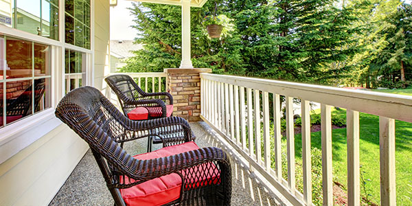 Wicker Chairs and Hanging Basket on Front Porch