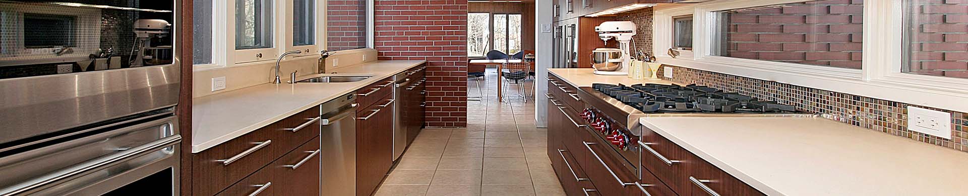 Galley Kitchen With Dark Cabinets