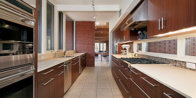 Galley Kitchen With Dark Cabinets