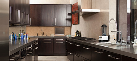 Sleek cabinetry in a galley kitchen remodel.