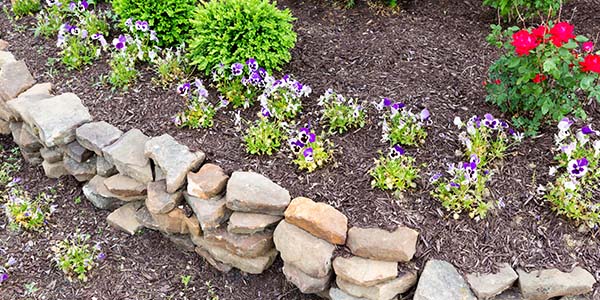 Small Garden Wall Made With Flat Landscape Stones