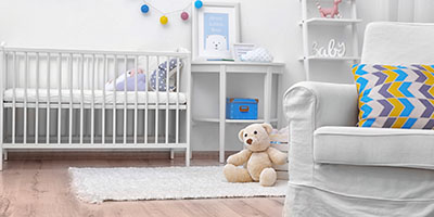 Teddy Bear in Organized Nursery Room