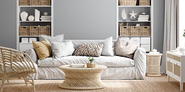 Neutral Living Room With Throw Pillows, Wood Furniture and Grey Wall