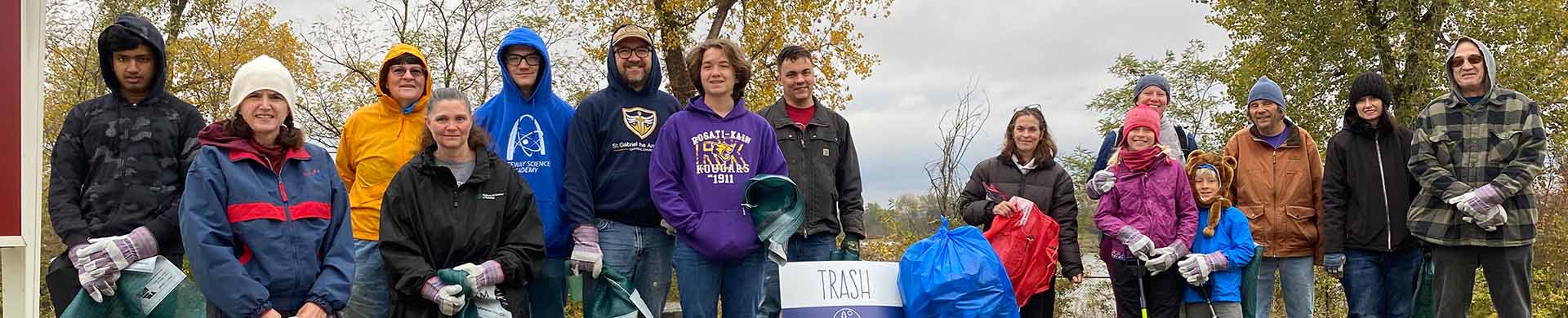Open Space STL Volunteers With Trash From Cleanup