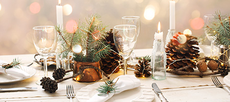 Festive Table Setting With Glassware and Silverware